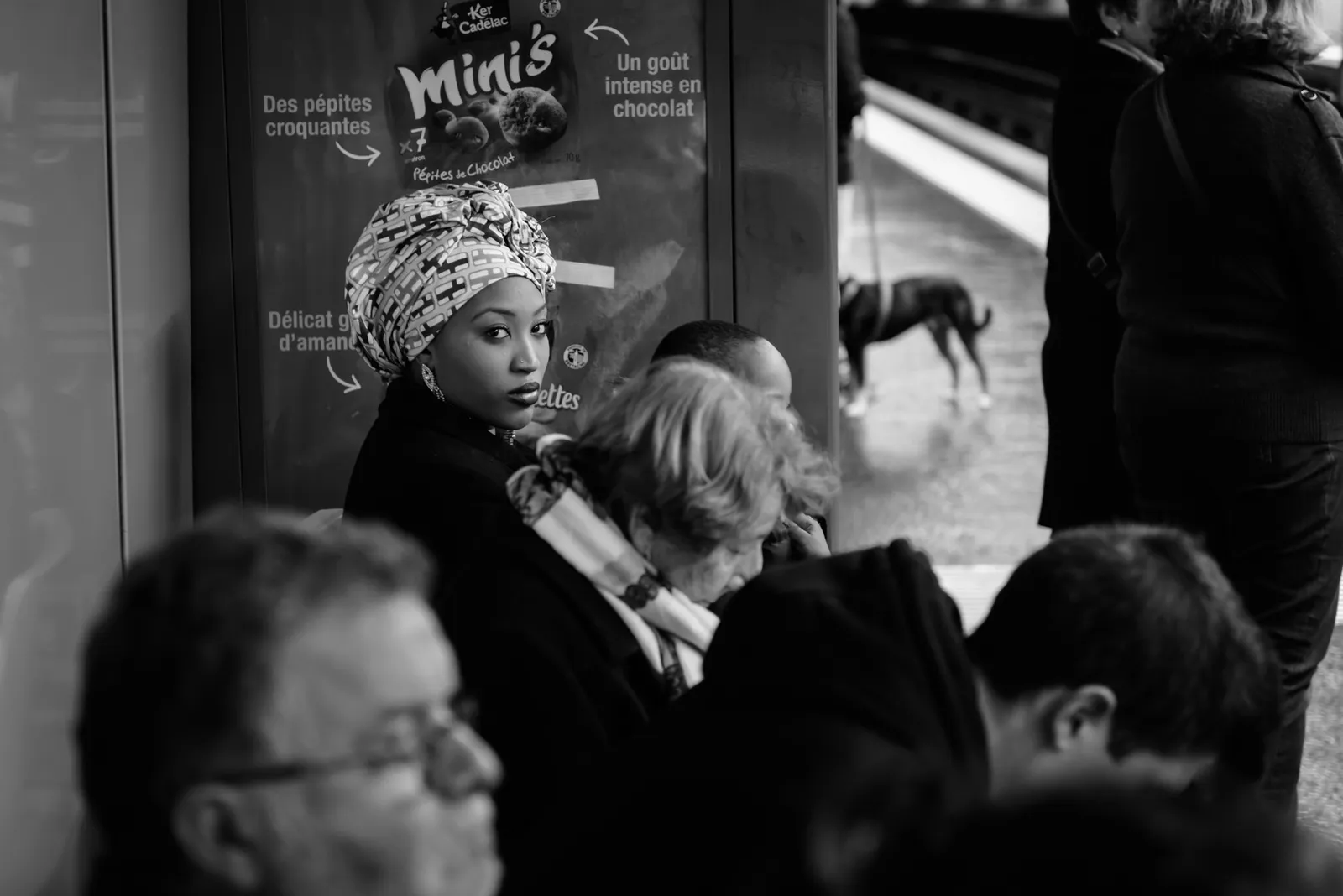 People gathered at a cafe in black and white